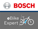 On voit un logo divisé en deux. La partie supérieure affiche le logo Bosch, la partie inférieure le logo eBike Expert.